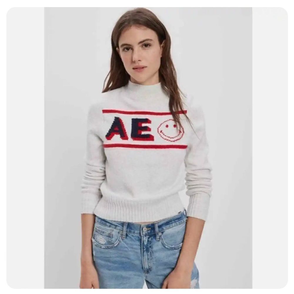 American Eagle Smiley Graphic Mock Neck Sweater